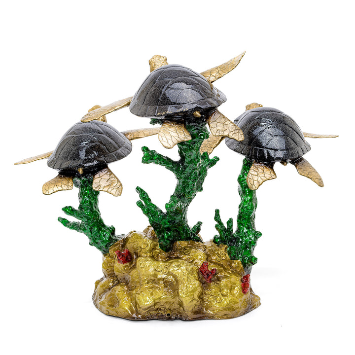 Marine life-inspired turtle trio water feature.