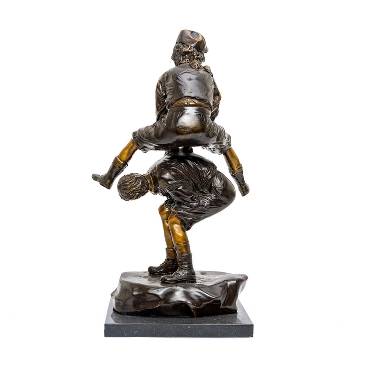 Charming bronze figurine of kids playing