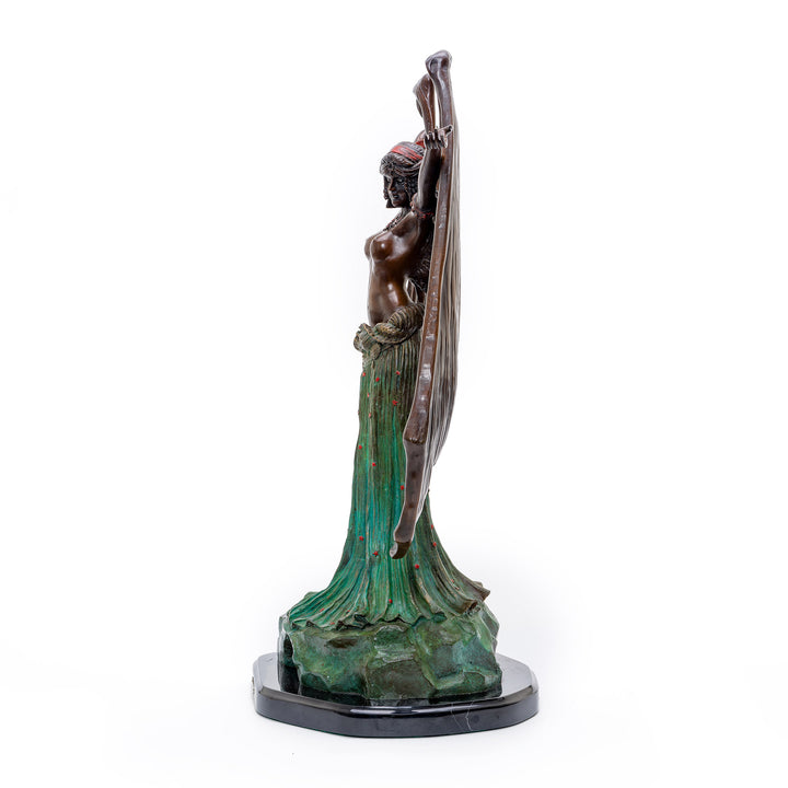 Vintage bronze sculpture of a Bat Lady, a testament to fantasy art