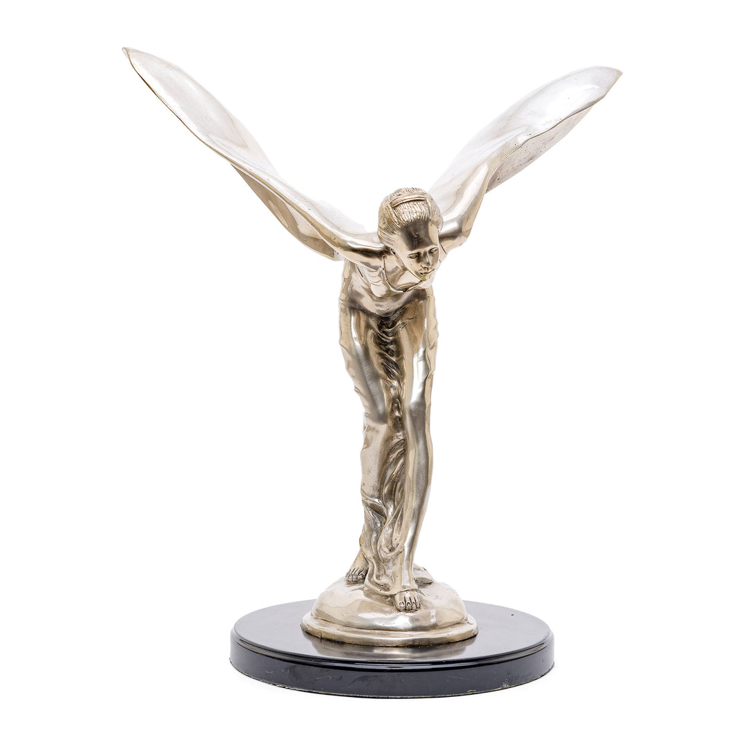 Exquisite silvered bronze winged lady sculpture evoking luxury and history