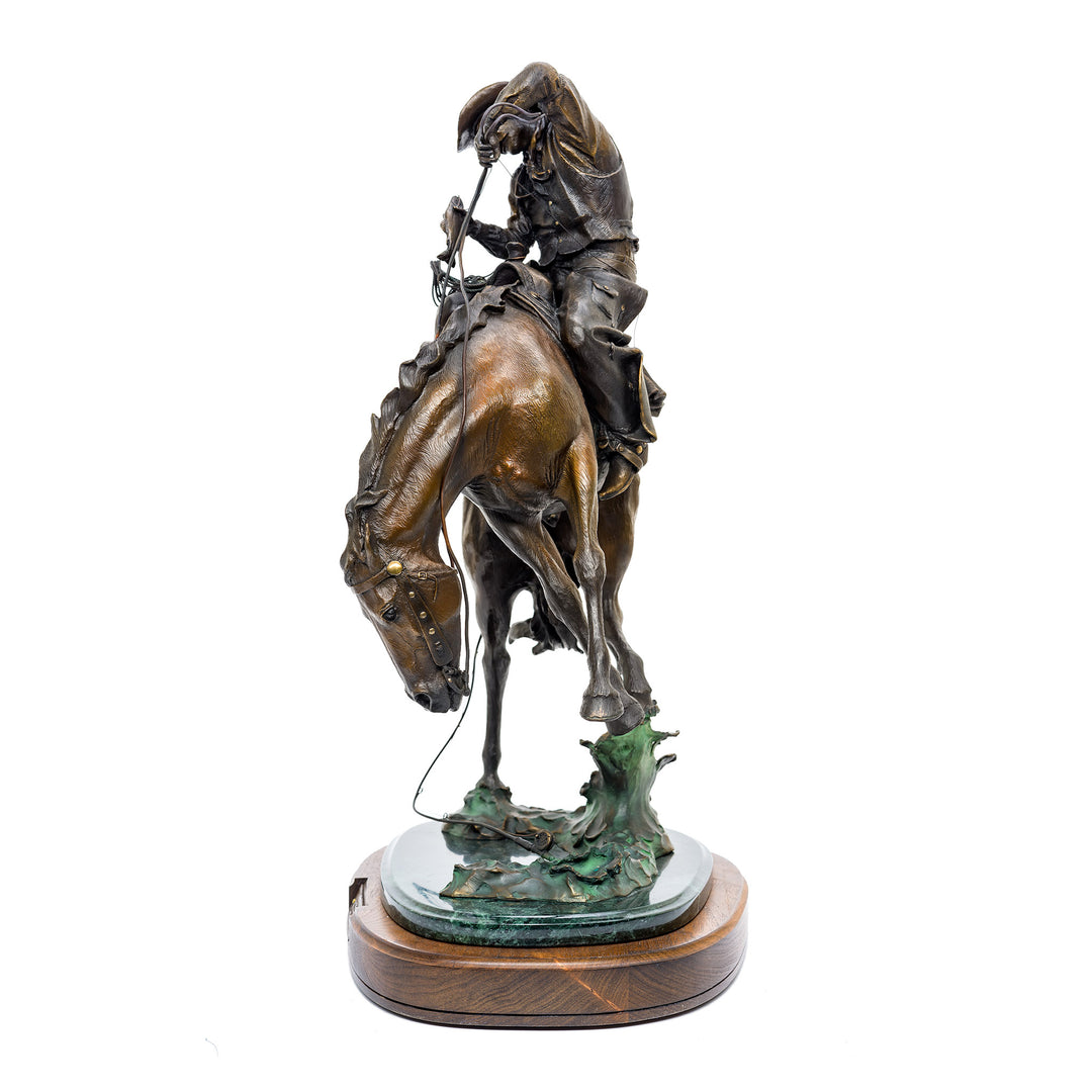 Signed and numbered On The Fly cowboy sculpture