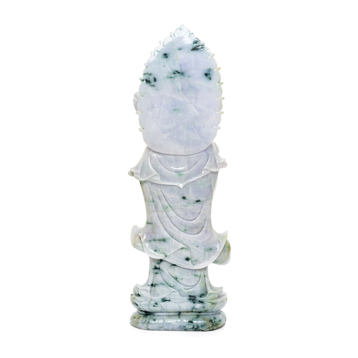 Exquisite jade artwork of Kwan Yin with symbolic elements