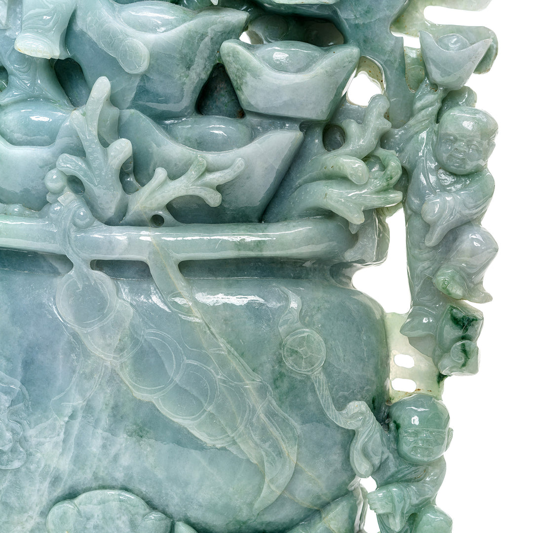 Timeless jade artwork of a flower pot with wealth-attracting design.