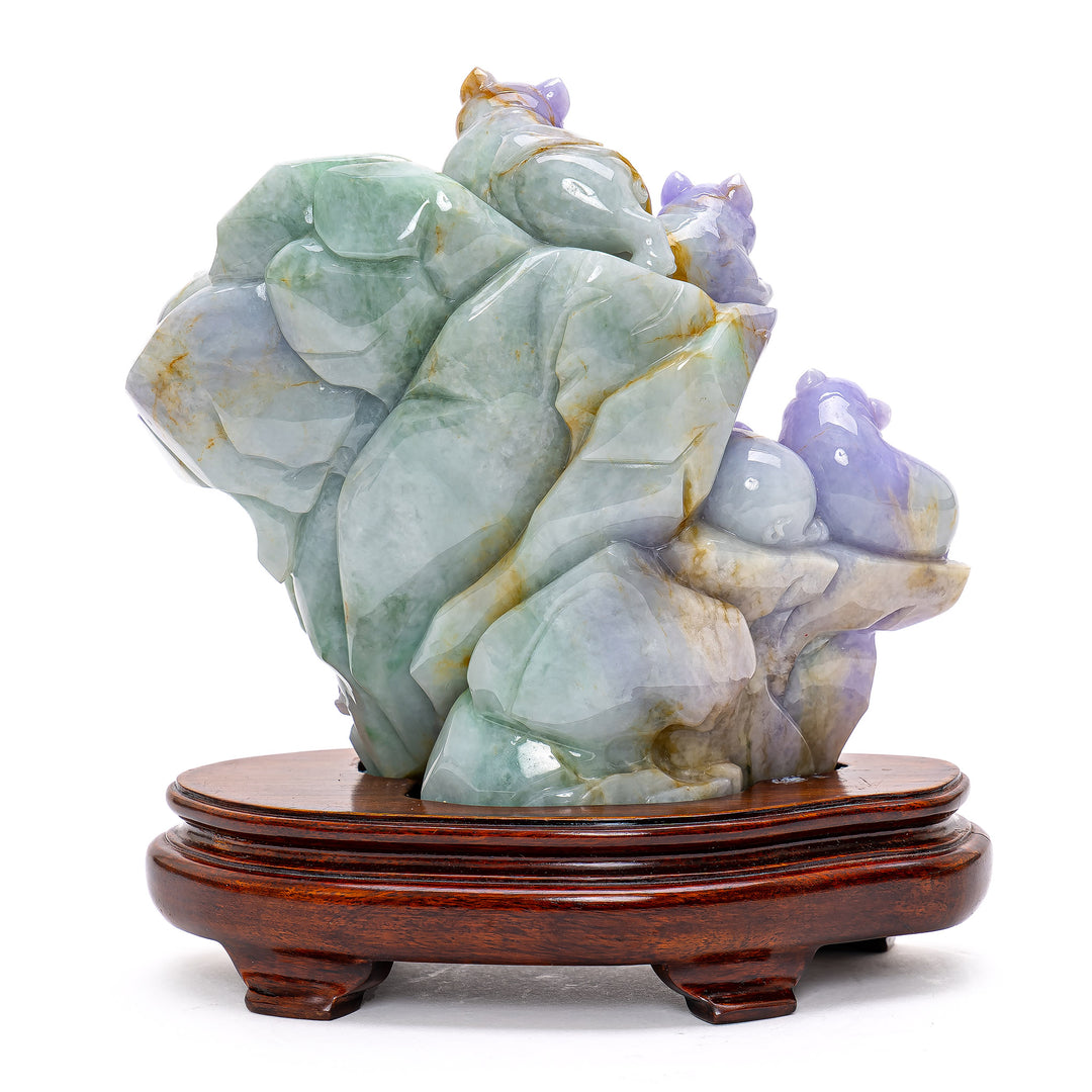 Handcrafted jade masterpiece featuring joyful pigs in lavender and pale green shades.