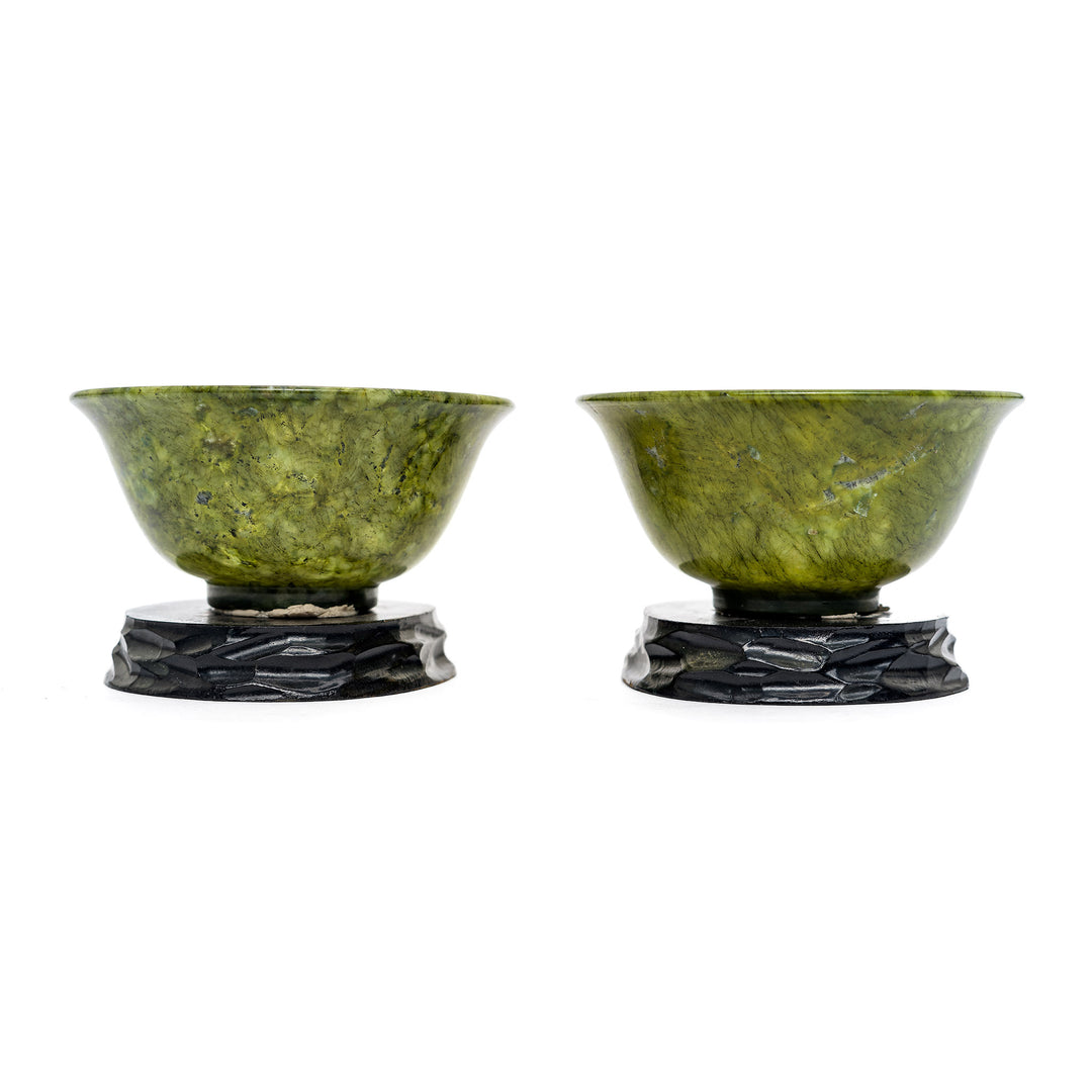 Natural stone spinach green bowls with intricate wooden bases