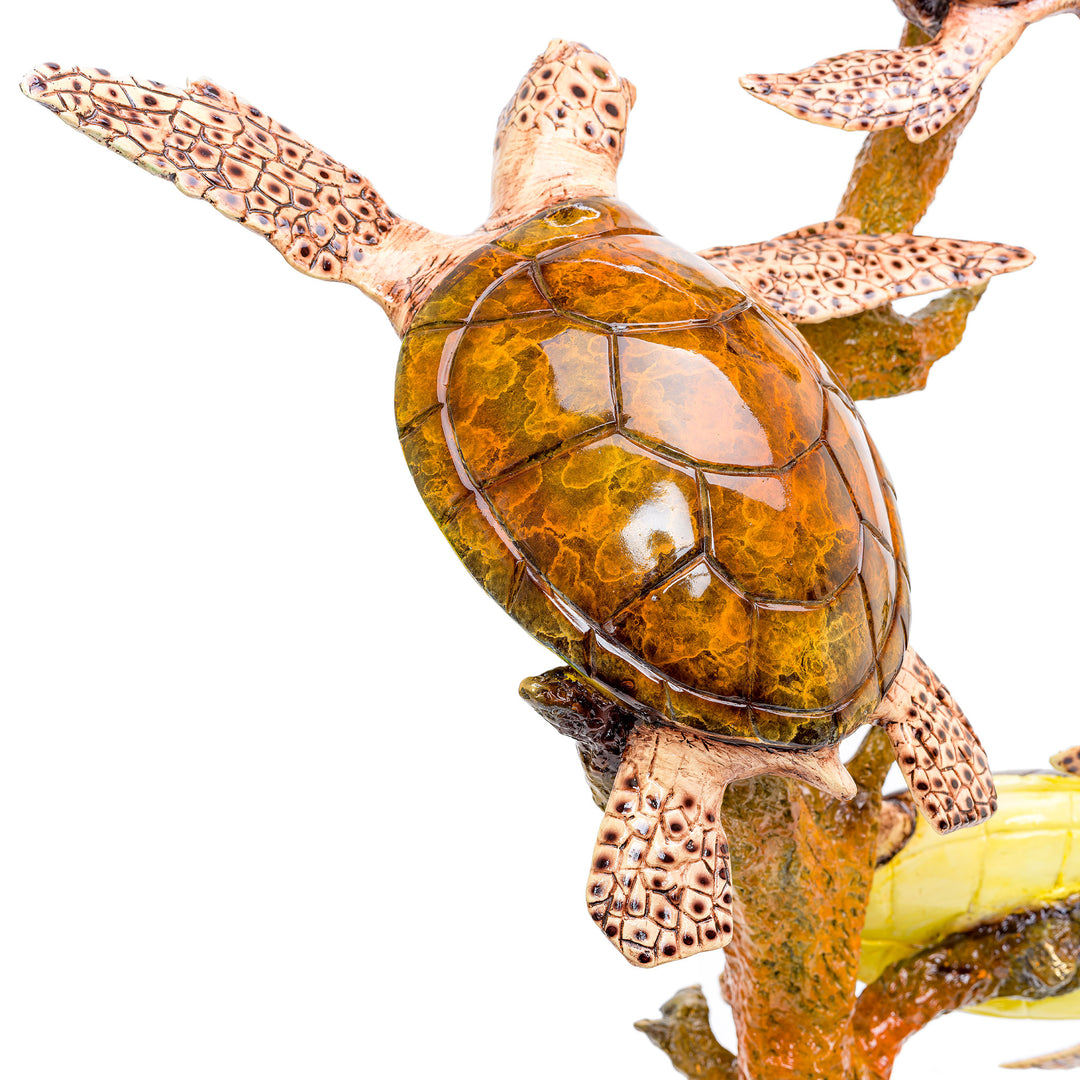 Elegant bronze sea turtle trio for nautical enthusiasts.