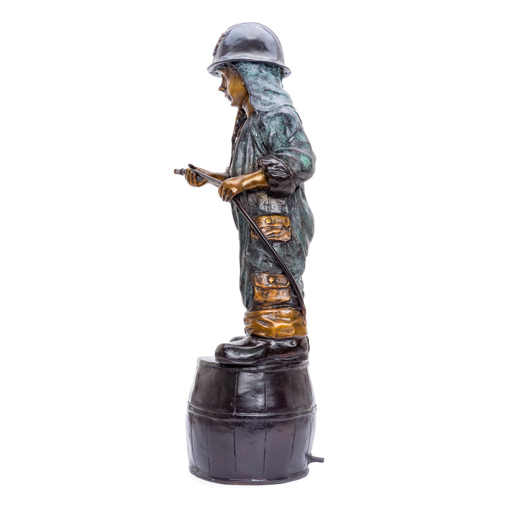 Detailed sculpture of child dressed as a firefighter in bronze.