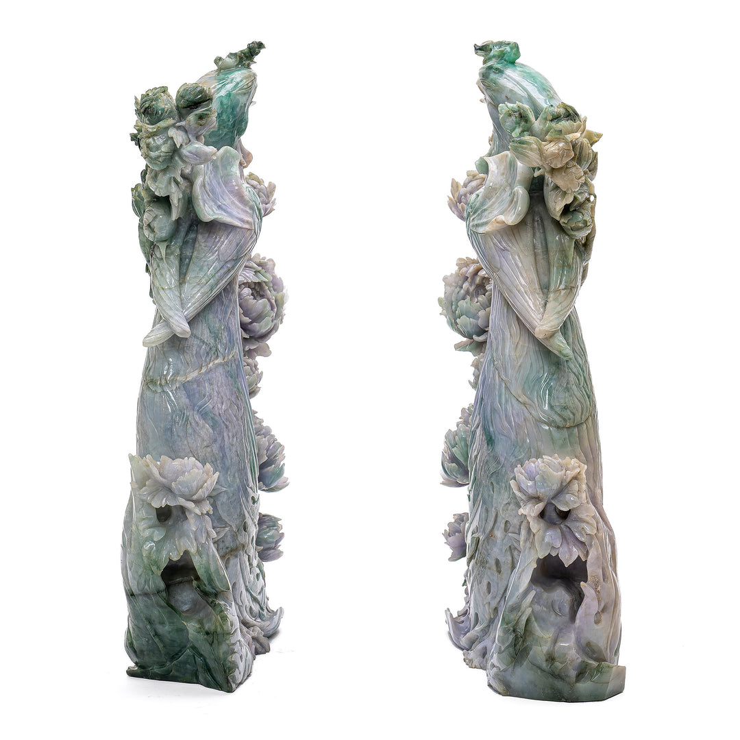 Handcrafted jade representation of paired phoenix birds.