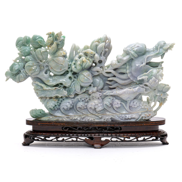 Jade masterpiece symbolizing prosperity with children and fruits