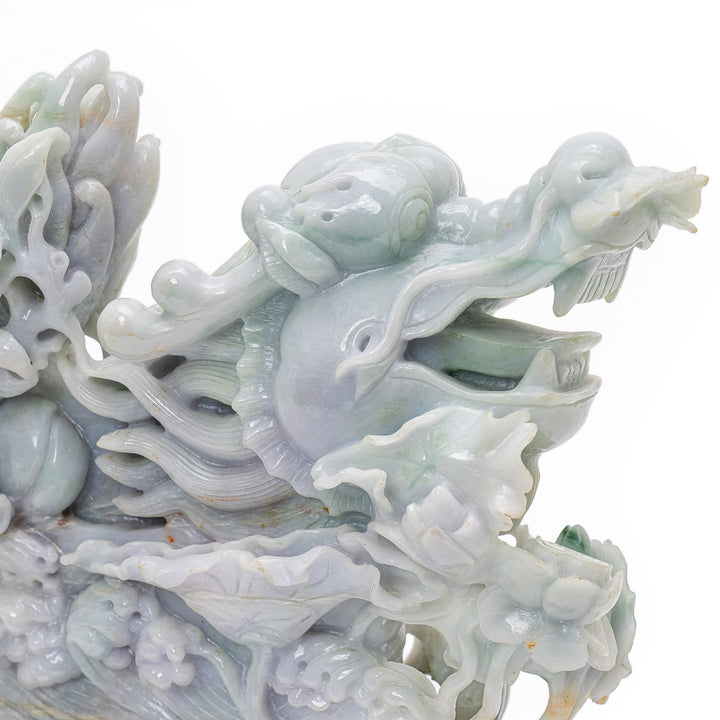 Traditional jade sculpture of a mythical dragon boat.