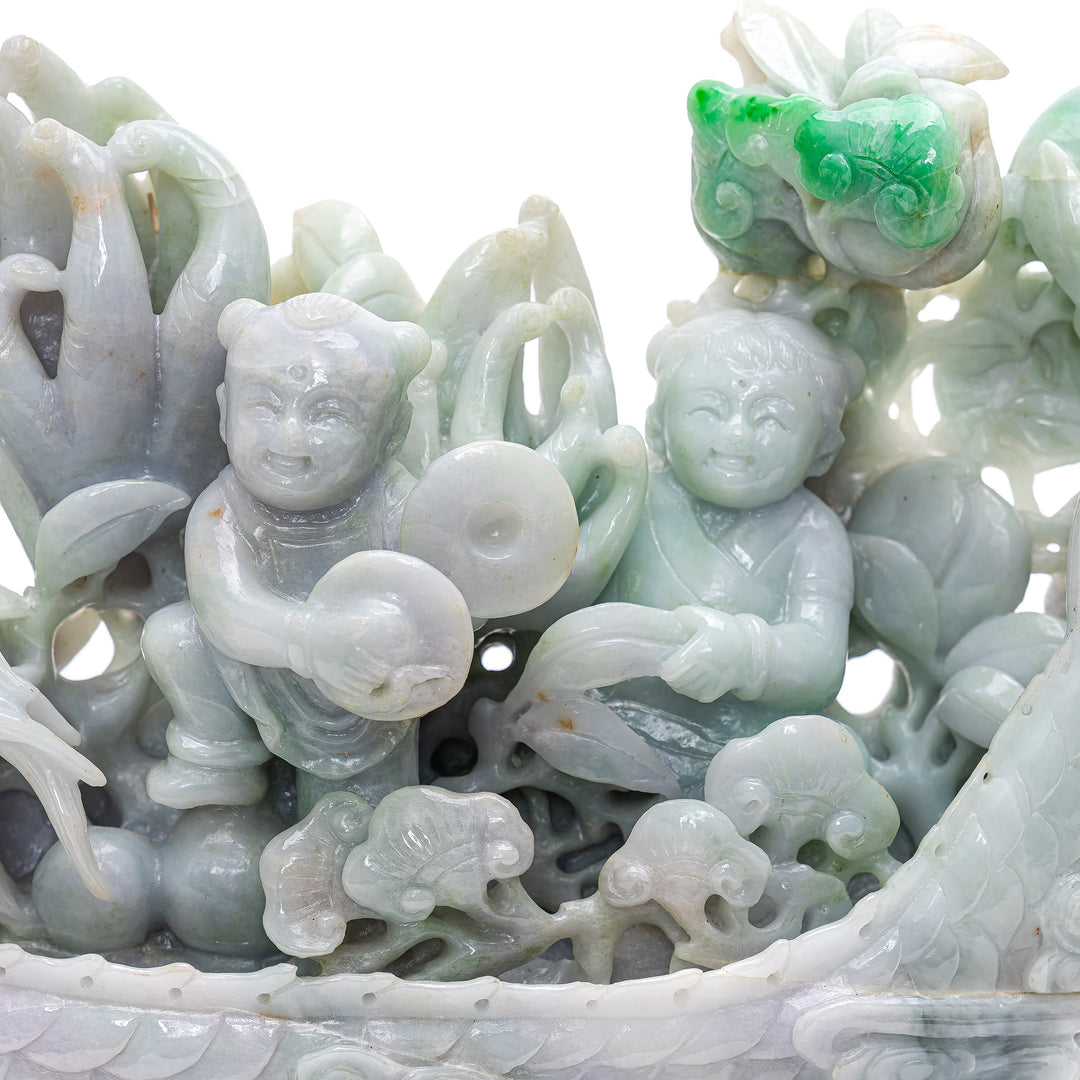 Whimsical jade piece capturing dragon's voyage with children