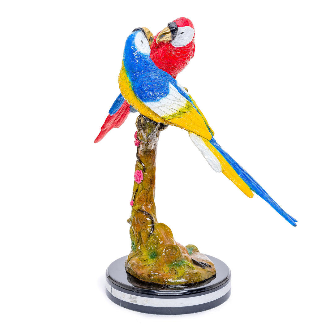 Exotic beauty of hand-painted kissing parrots, immortalized in bronze