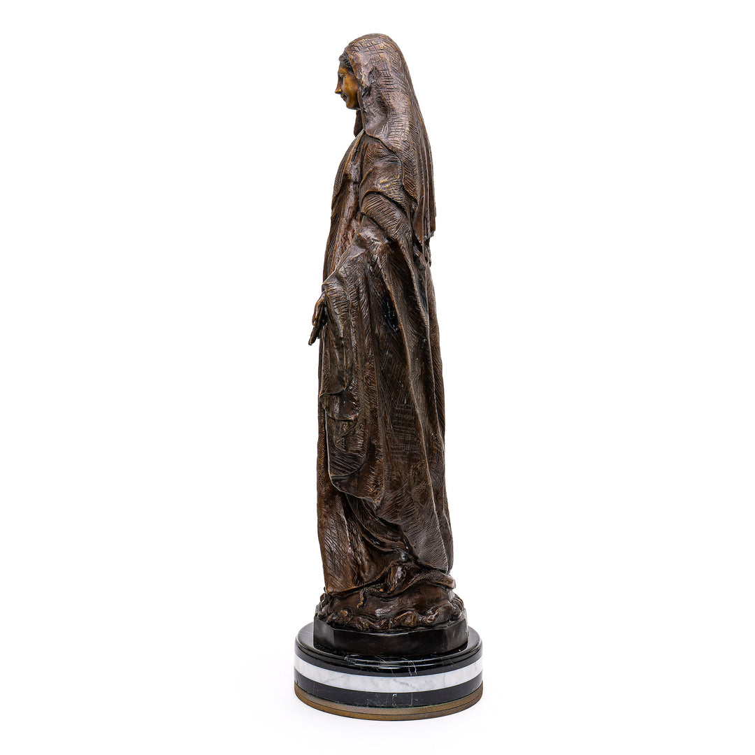 Heavenly depiction of Mother Mary in elegant bronze.