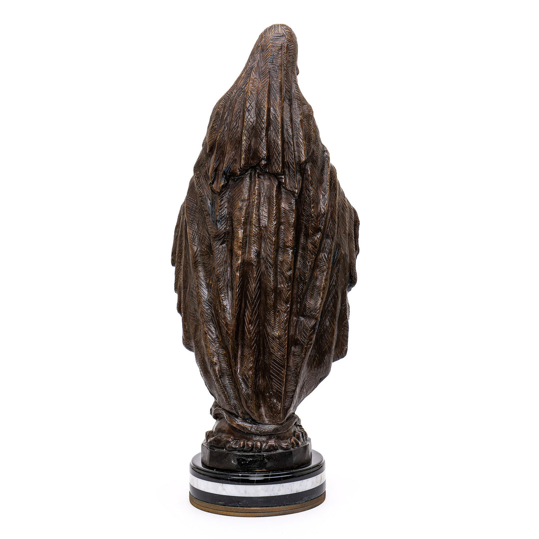 Our Lady Immaculate, symbolizing eternal faith in bronze.