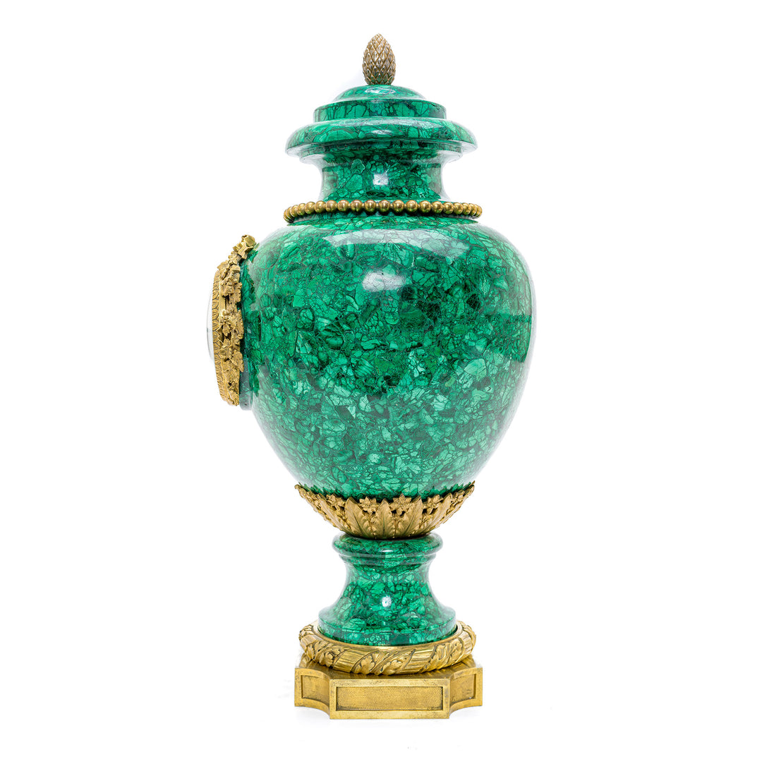 Exquisite vase clock crafted from true malachite with an acorn finial.