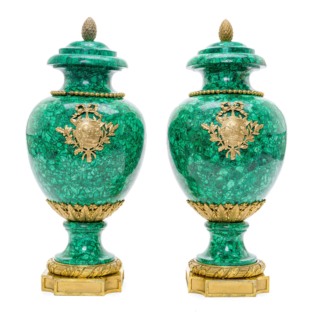Pair of 19th-century true gem-quality malachite vases with Roman bust mounts.