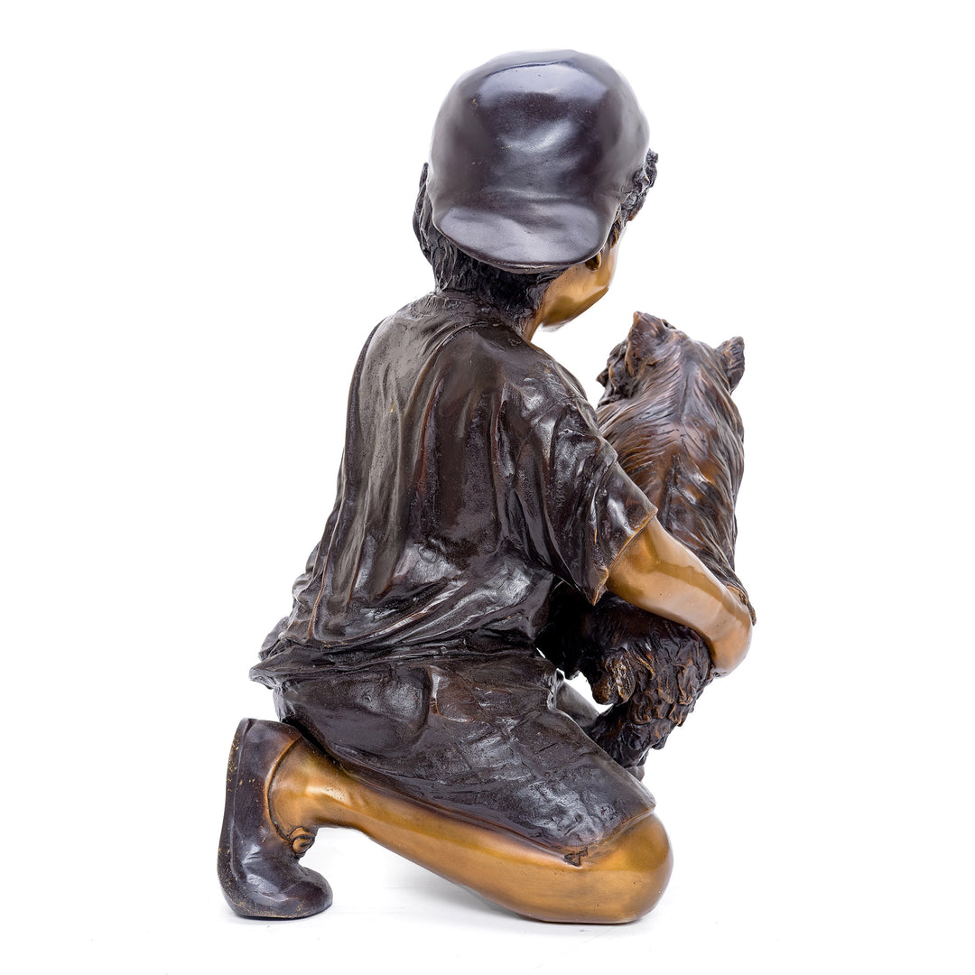 Emotional bronze piece reflecting the bond between boy and dog.