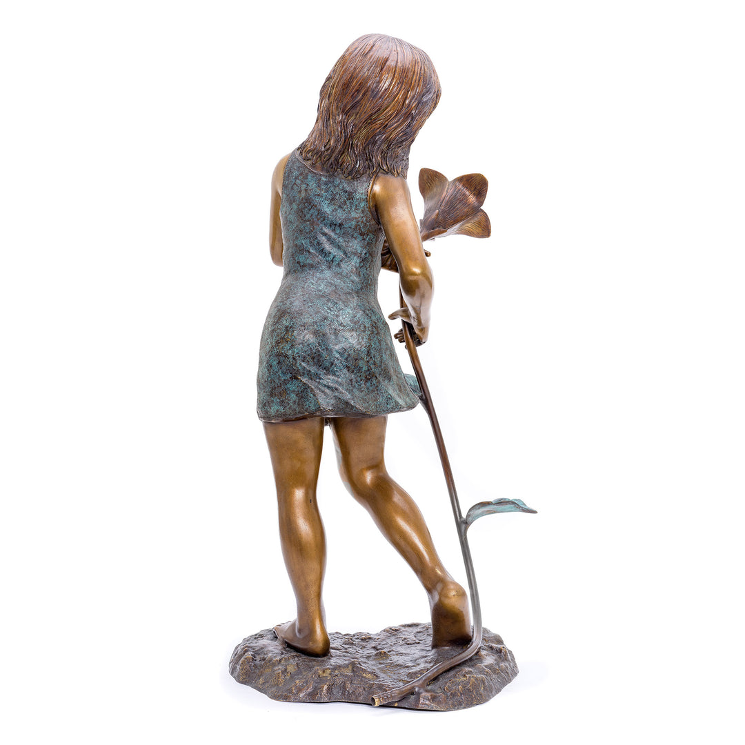 Charming childhood-themed bronze sculpture for gardens.