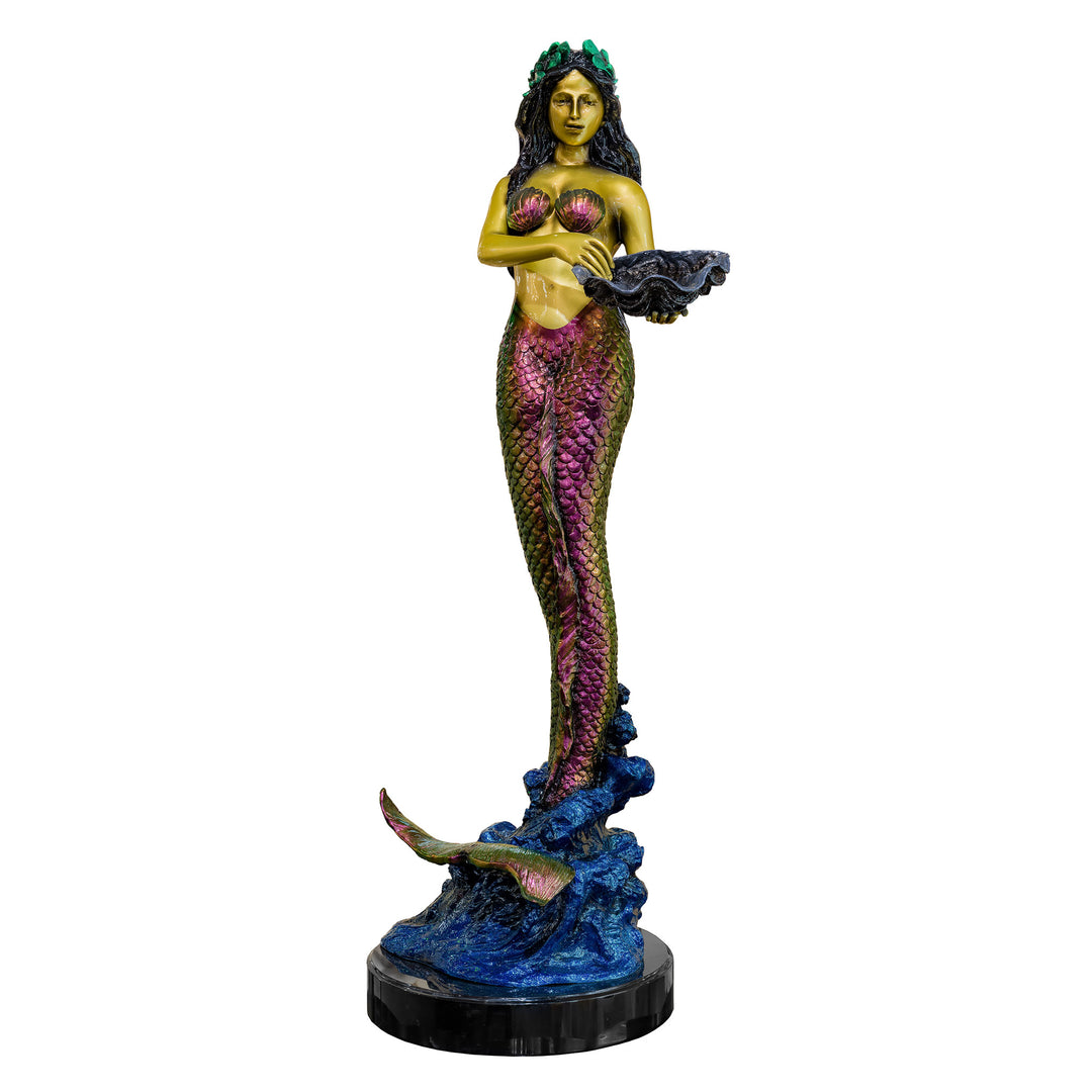 Bronze mermaid sculpture holding a shell.