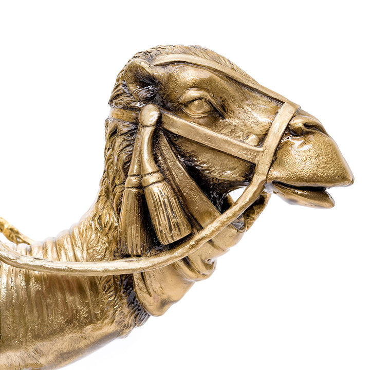 Exquisite detail in bronze captures an Arabian nomad atop his enduring companion