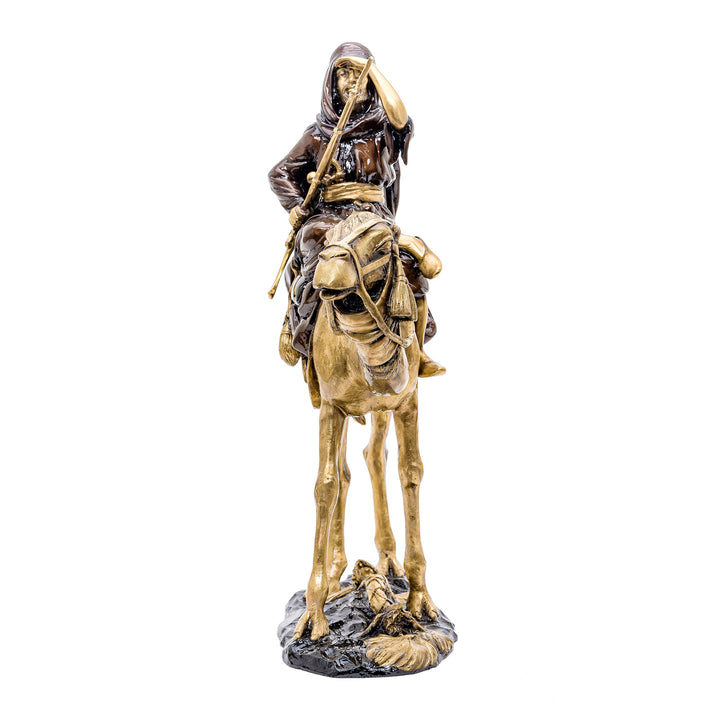 Bronze Arabian on camel statue, celebrating the heritage and adventure of desert life