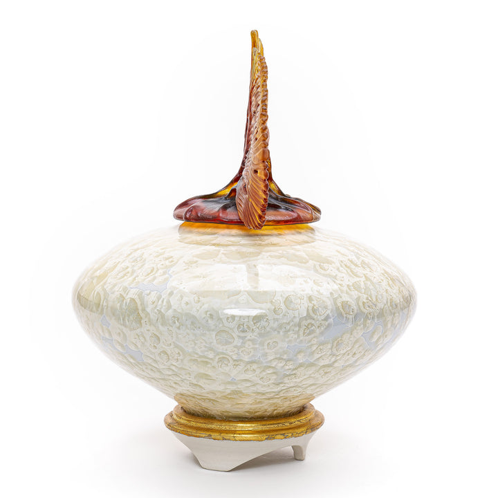 Pale sea green and ivory porcelain vase with amber glass seashell finial