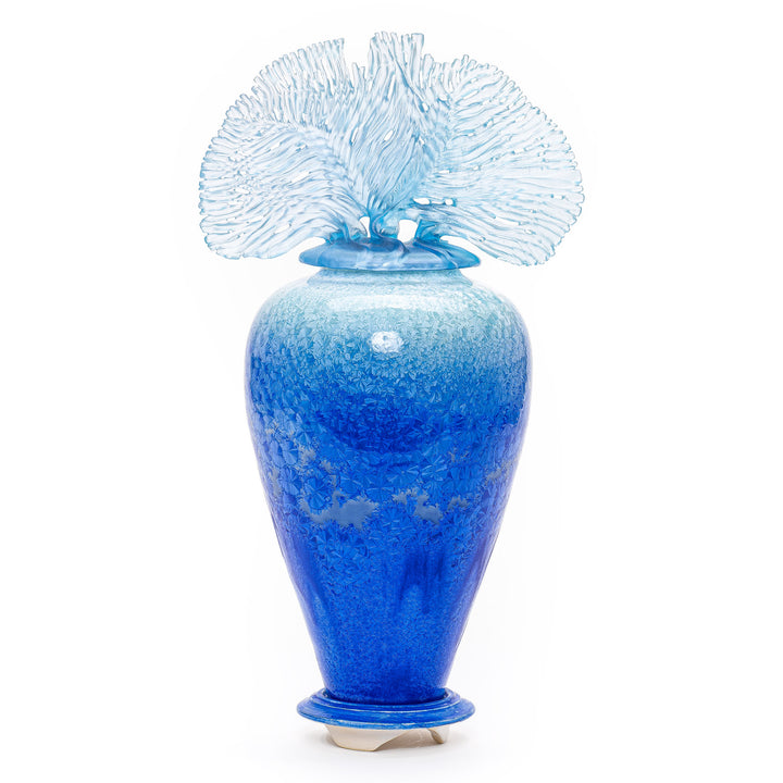 Tall deep blue and sea green porcelain vase with glass seashell finial