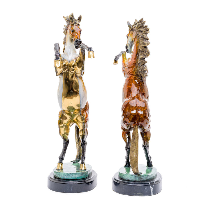 Elegantly crafted pair of stallions in bronze, rearing on high-quality marble