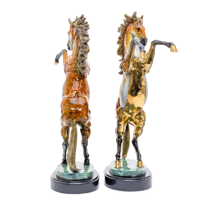 Artistic bronze rendering of rearing horses, perfect for collectors and equestrian enthusiasts