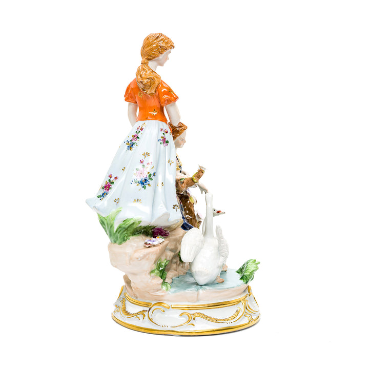 Porcelain ladies with swans sculpture ideal for collectors and art enthusiasts.