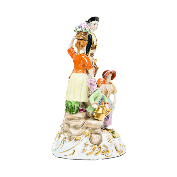 Beautiful porcelain statue of a family in the garden