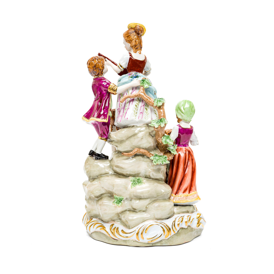 Exquisitely crafted woman and children musicians figurine