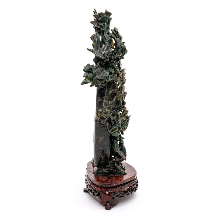 Birds & cranes come to life on this enchanting jade vase.