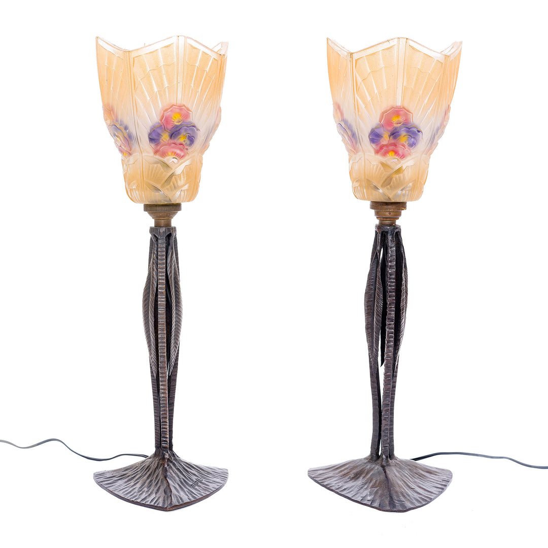 Rare Art Deco iron lamps by Le Fer Forgé HF with polychrome floral glass shades.