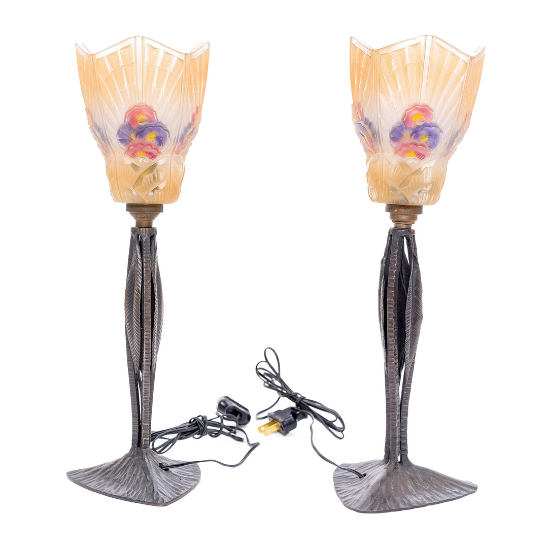 Collectible iron table lamps with characteristic Art Deco polychrome glass.