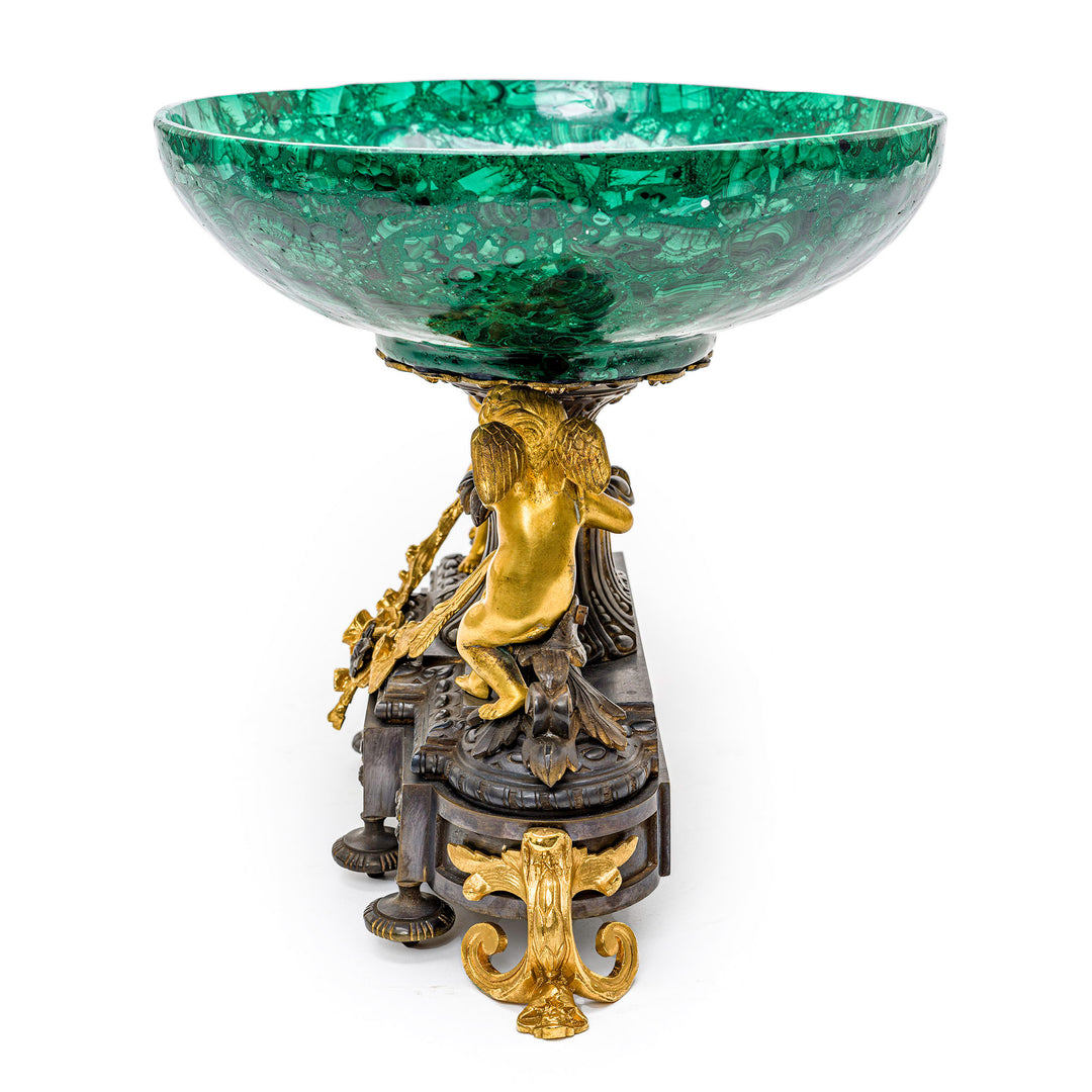 Regal green malachite centerpiece with intricate bronze detailing.