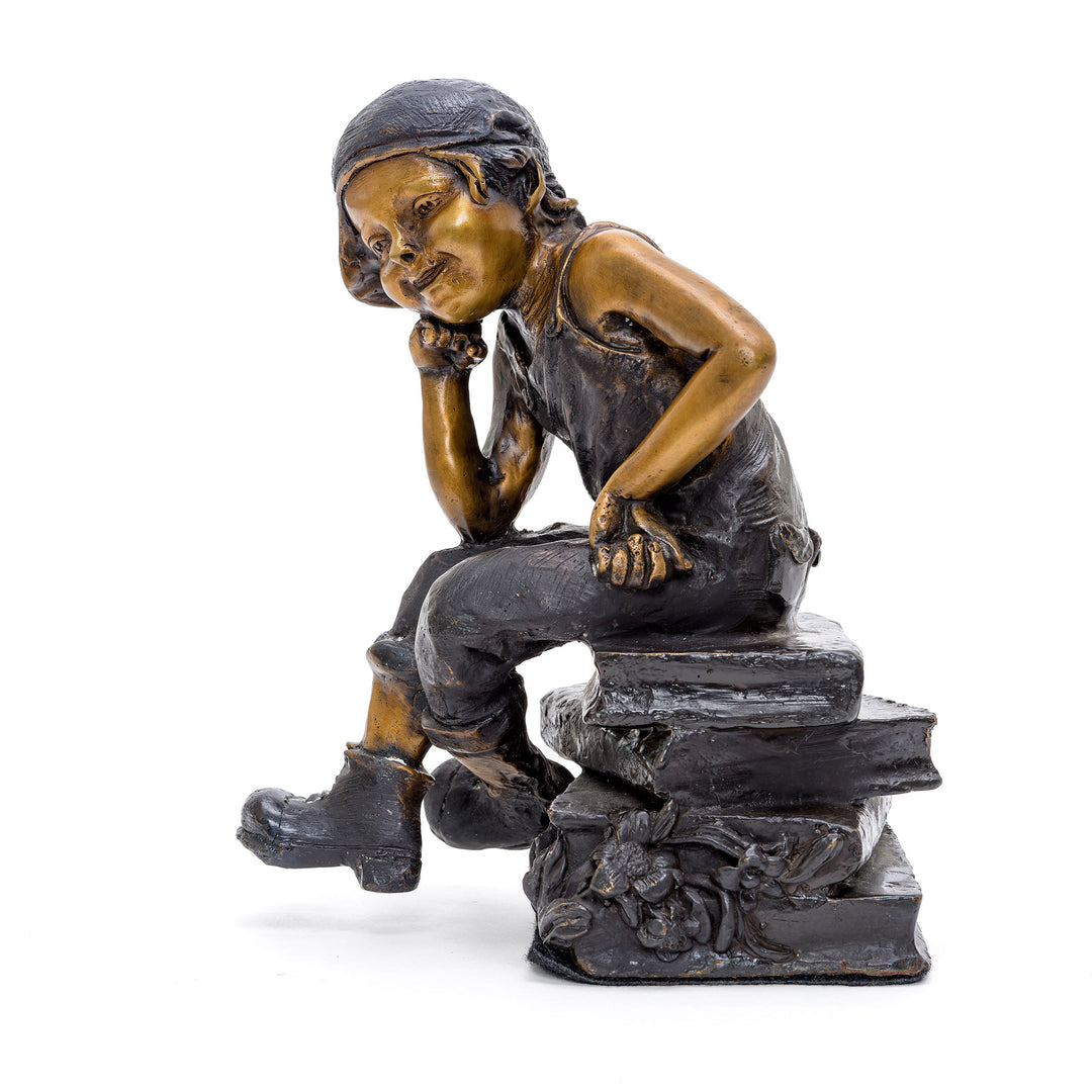 Scholarly Boy in Deep Thought on Books in Bronze.