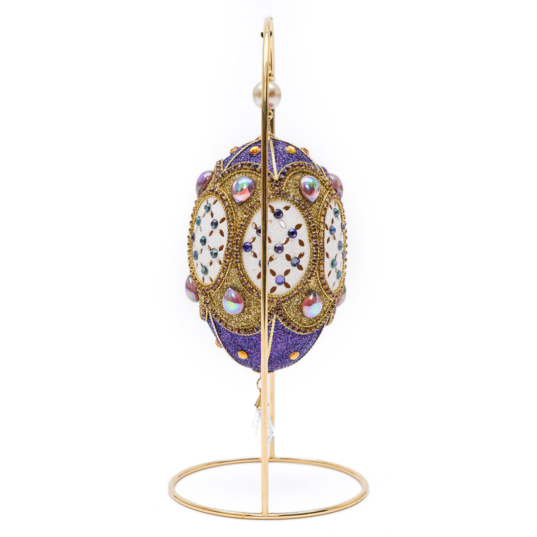 Detail of Swarovski crystal brilliance on a lustrous purple ostrich egg ornament