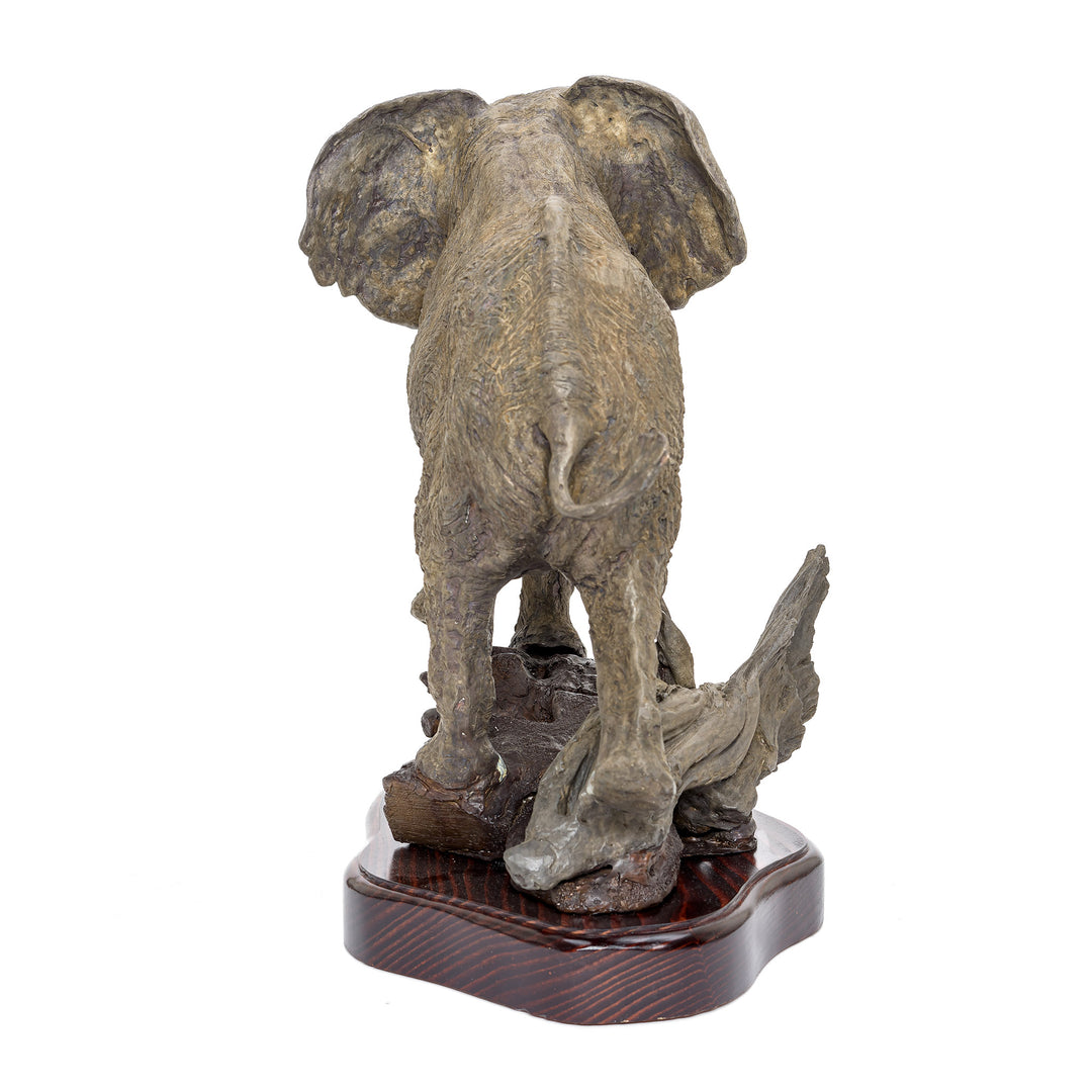 Majestic signed and numbered bronze elephant statue on a wooden base