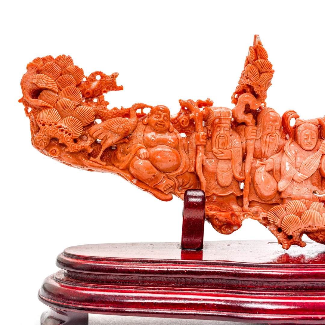 Vibrant coral sculpture showcasing the Seven Immortals of Chinese legend.