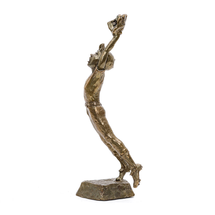 Exultant figure with raised hand in Mark Hopkins bronze artwork.