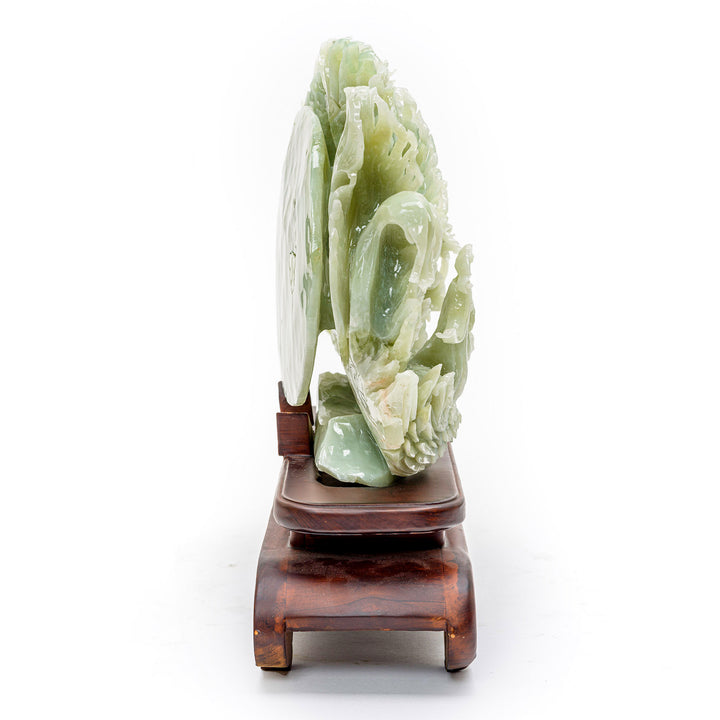 Serene green agate material in hand-carved mythical decor.