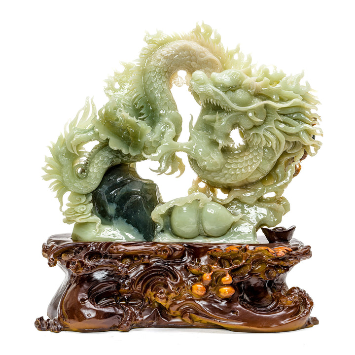 Majestic hand-carved agate dragon sculpture on wood base.