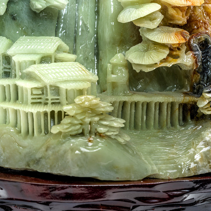 Traditional village scene carved into natural agate