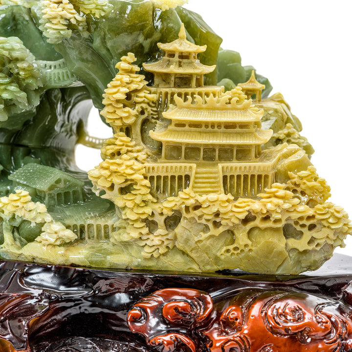 Detailed agate carving of a traditional village landscape