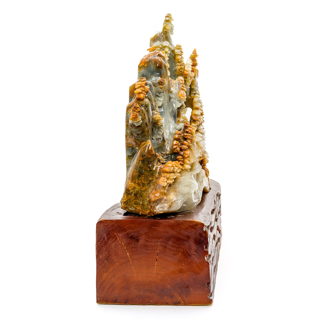 Detailed village and pagoda scene carved in agate