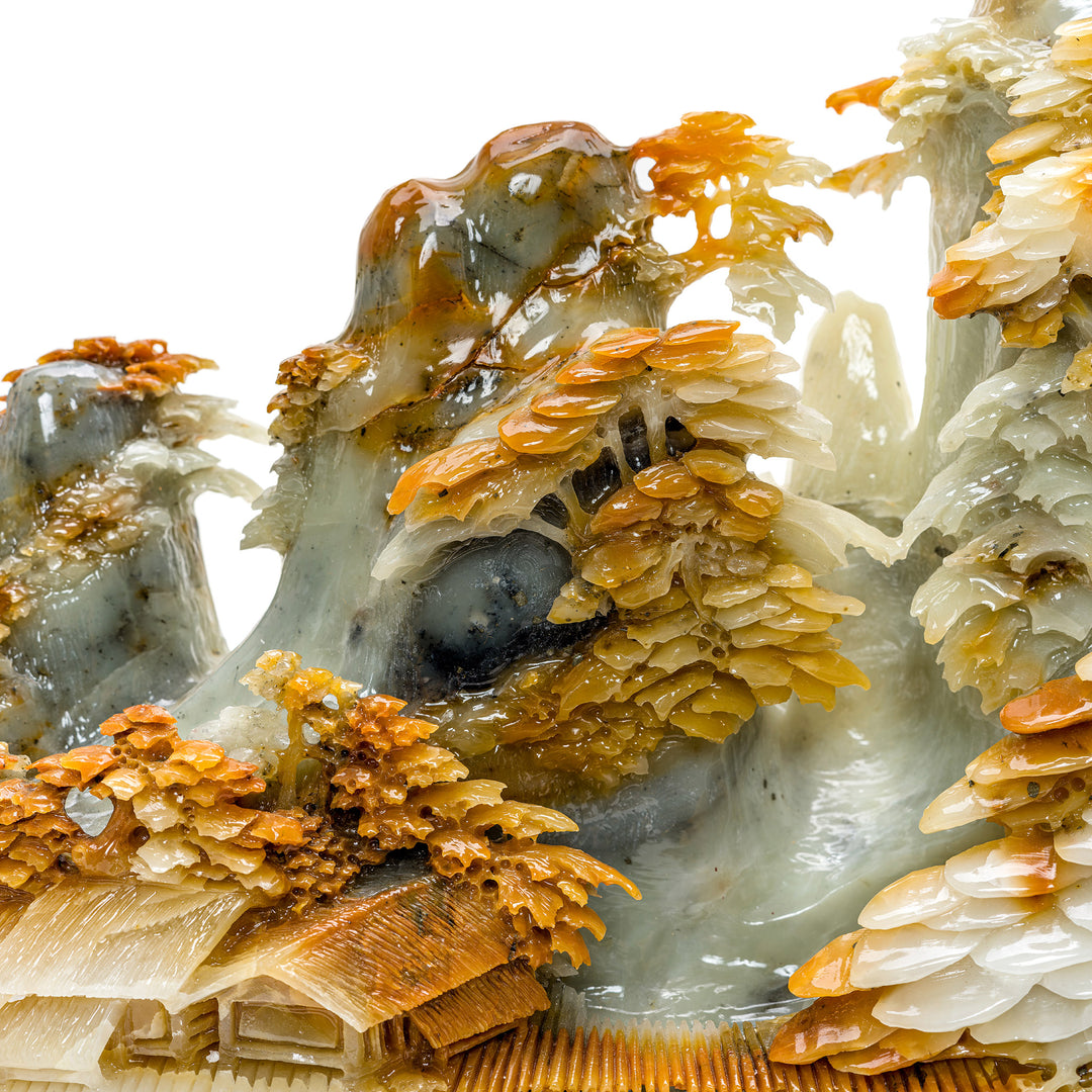 Agate mountainside artwork with intricate pagoda carvings