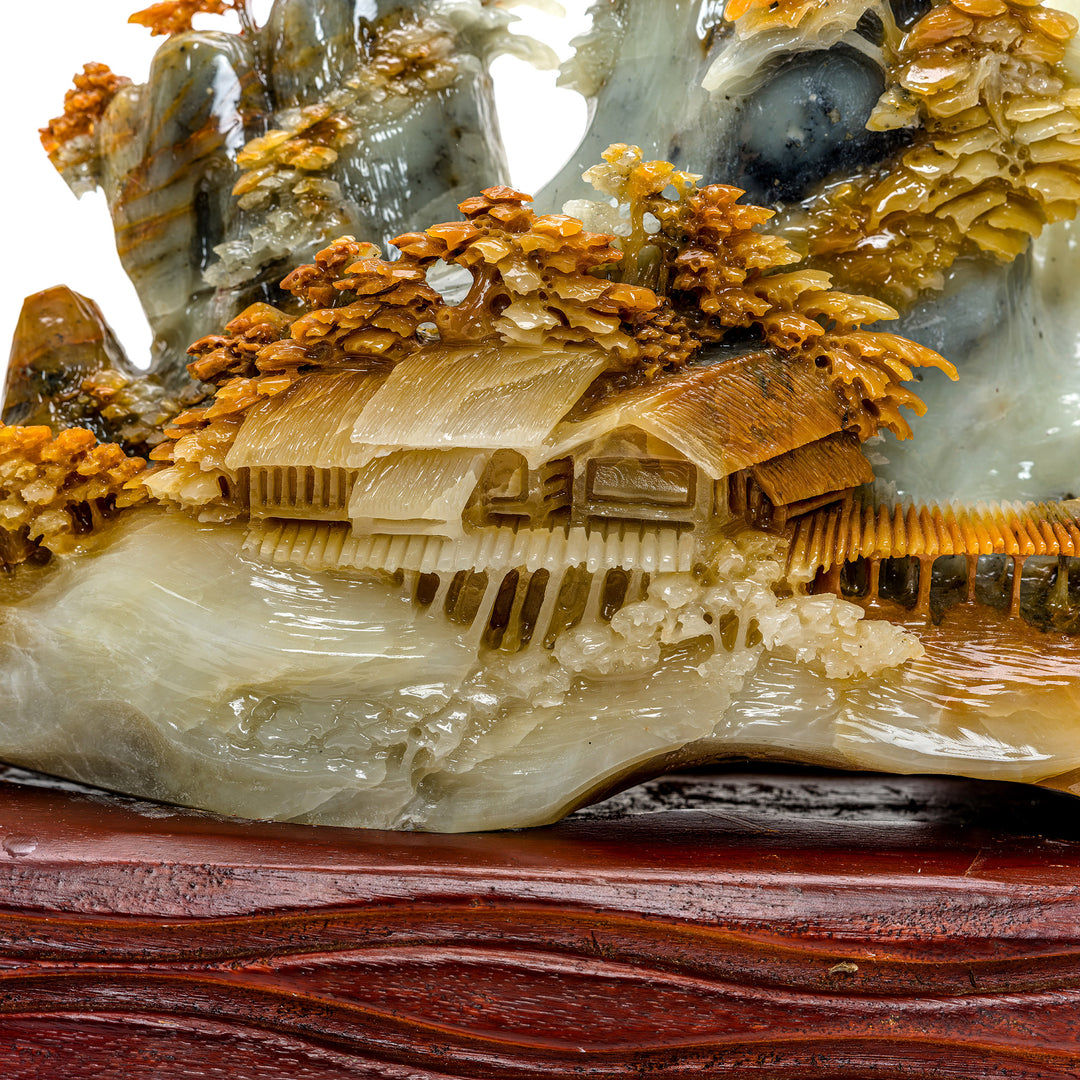 Traditional agate village sculpture nestled in pine forest