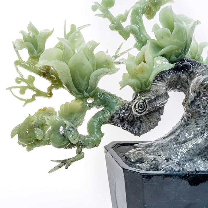 Blooming irises carved in agate within a vase, a symbol of natural elegance.
