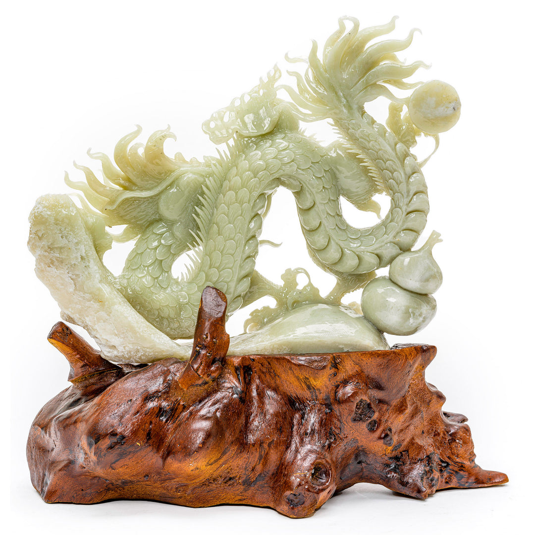Agate carving of a writhing dragon with a pearl, symbolizing enlightenment.